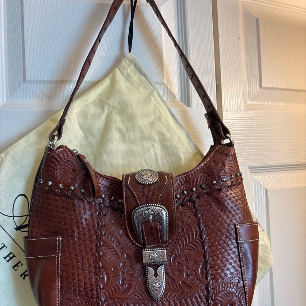 Gorgeous hand tooled Western American West luxury brand handbag.  Never used!